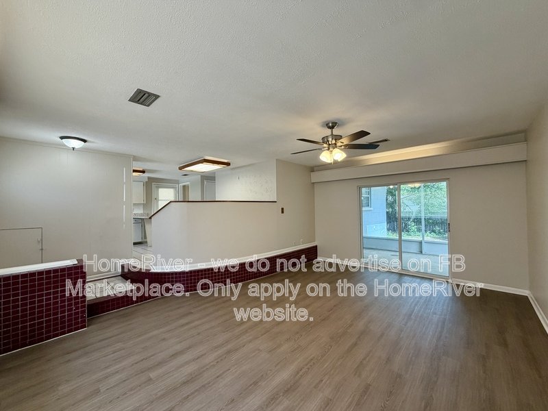 4 bedroom home with fenced yard and screened porch property image