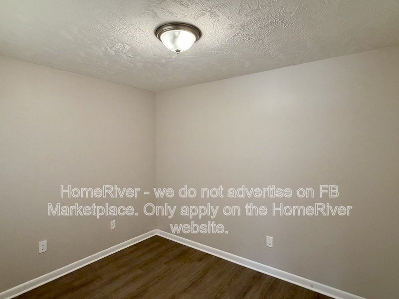 4 bedroom home with fenced yard and screened porch property image