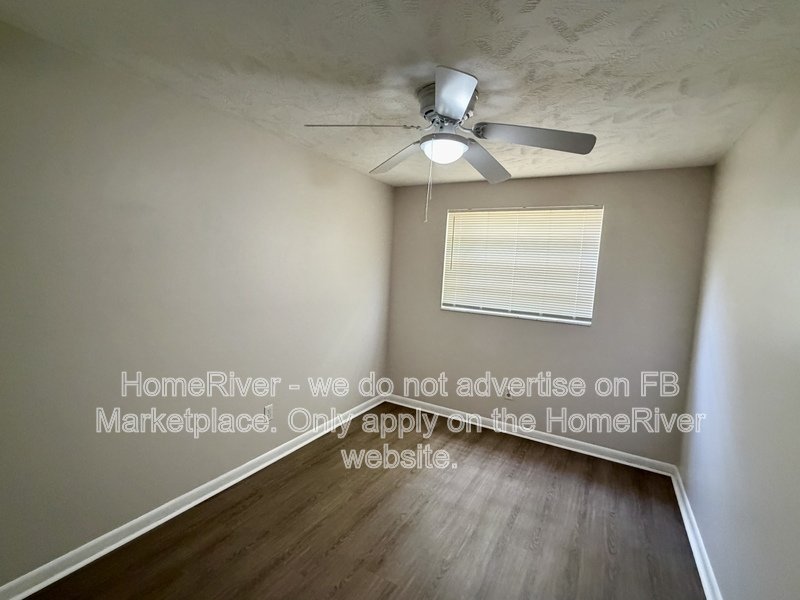 4 bedroom home with fenced yard and screened porch property image