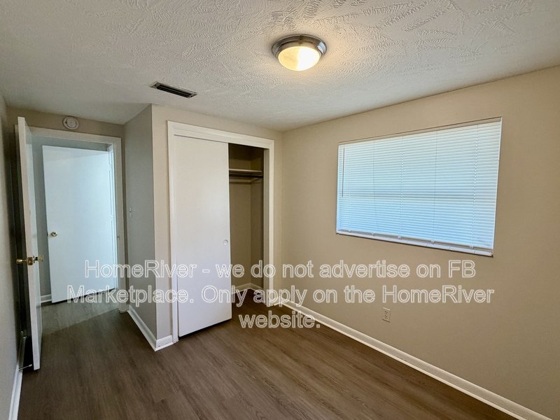 4 bedroom home with fenced yard and screened porch property image