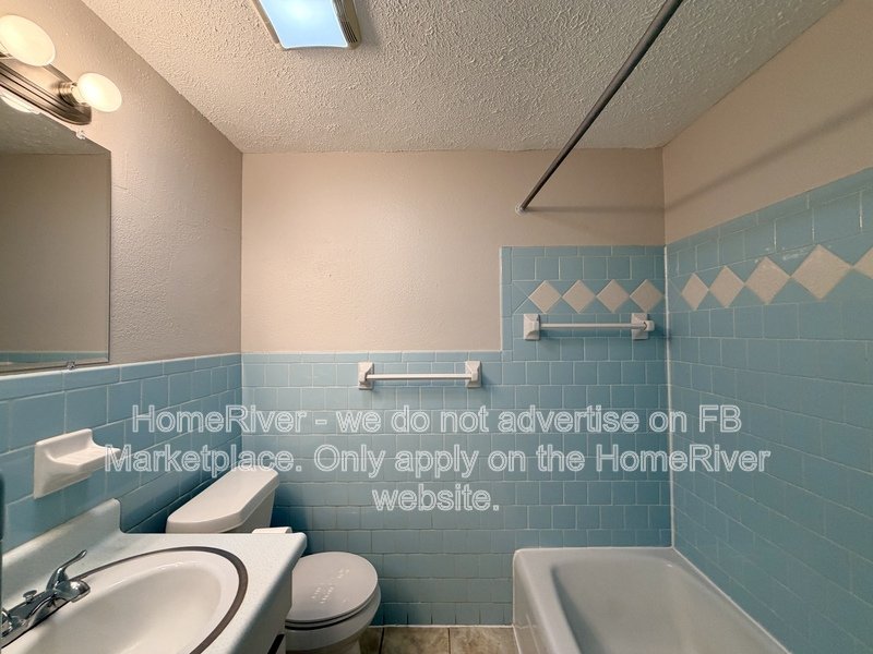 4 bedroom home with fenced yard and screened porch property image