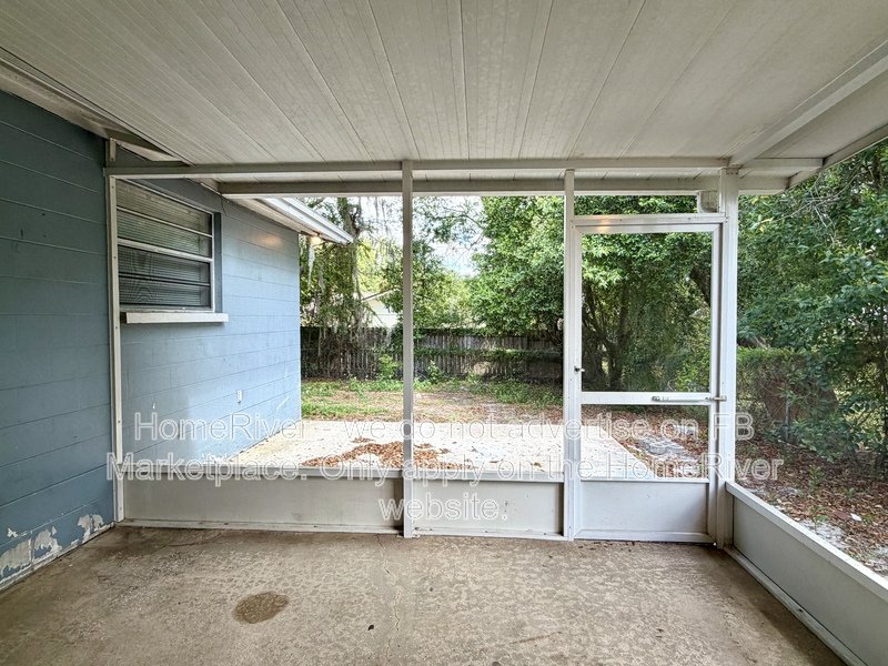 4 bedroom home with fenced yard and screened porch property image