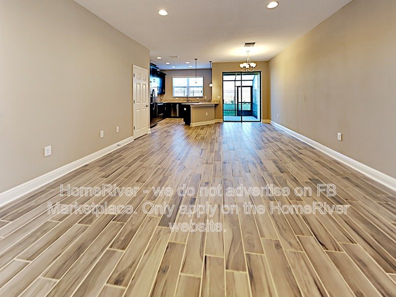 Gated Wiregrass Ranch Townhome with Pond View | Water Included! property image