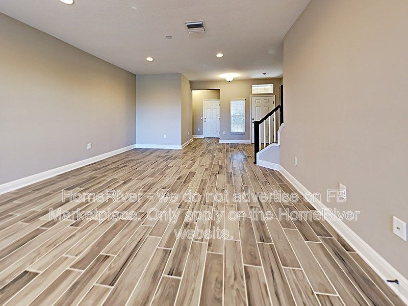 Gated Wiregrass Ranch Townhome with Pond View | Water Included! property image