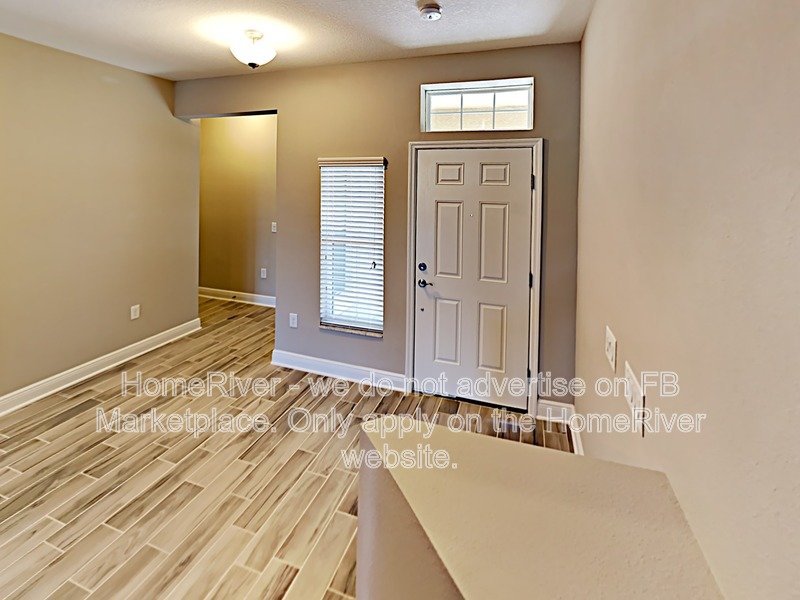 Gated Wiregrass Ranch Townhome with Pond View | Water Included! property image