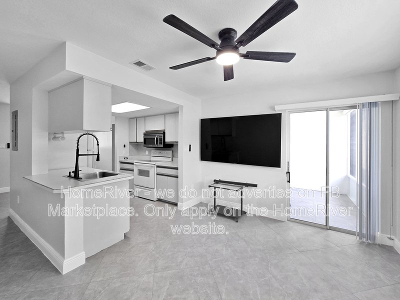 Walk to the Beach! 2/2 First-Floor Condo in Gated Community property image