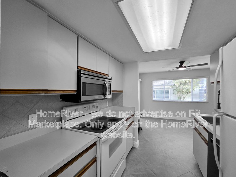 Walk to the Beach! 2/2 First-Floor Condo in Gated Community property image