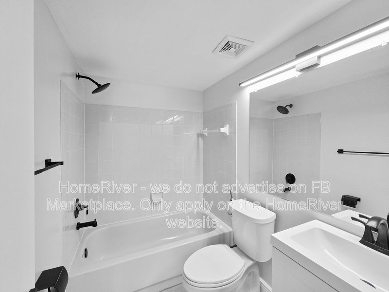 Walk to the Beach! 2/2 First-Floor Condo in Gated Community property image