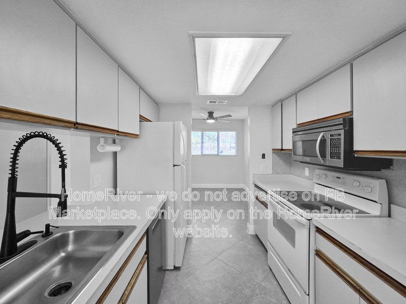 Walk to the Beach! 2/2 First-Floor Condo in Gated Community property image