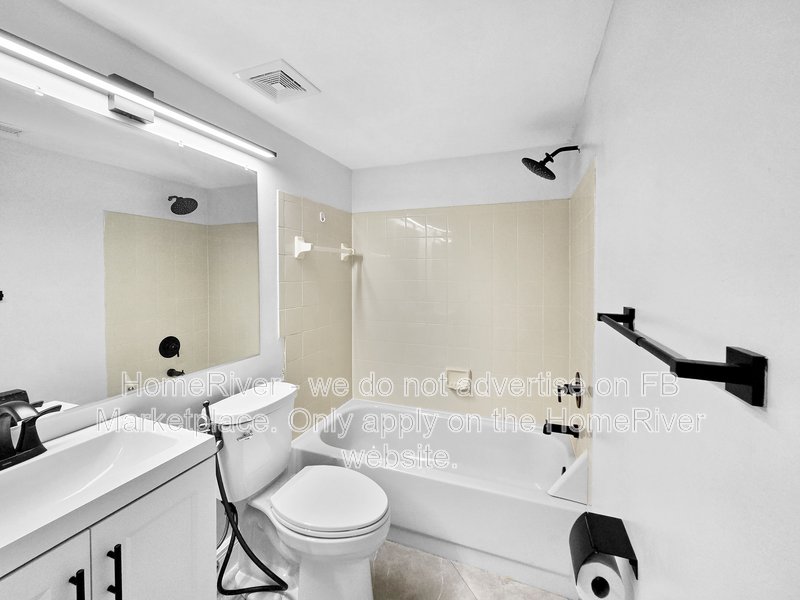 Walk to the Beach! 2/2 First-Floor Condo in Gated Community property image