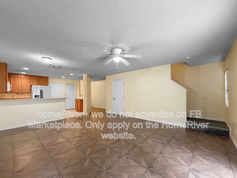 Townhome with a garage property image