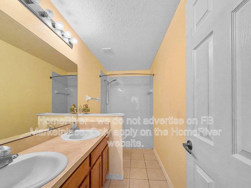 Townhome with a garage property image