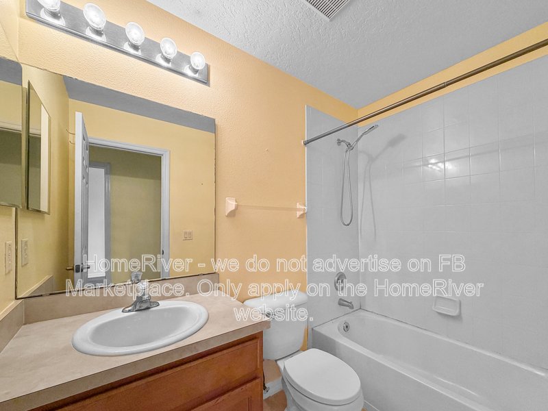 Townhome with a garage property image