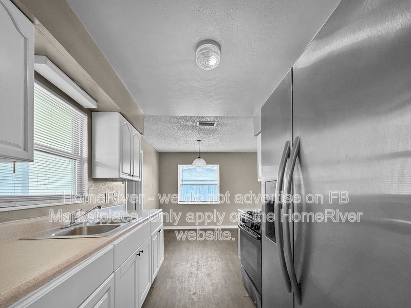 New Appliances | Laundry Room | Fenced | Gally Kitchen property image