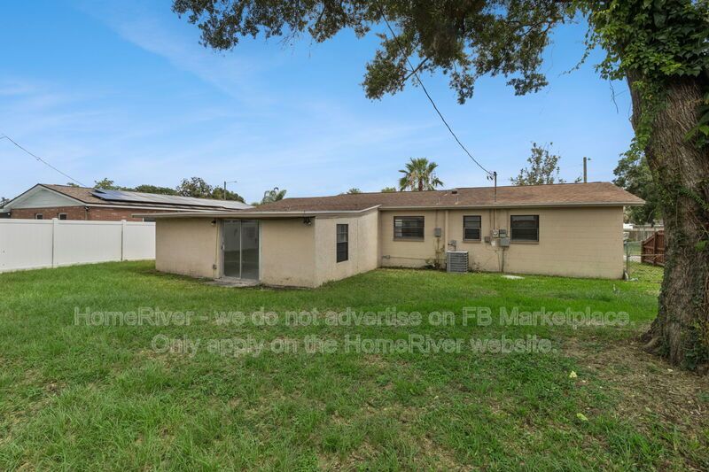 4 bedroom home with fenced yard property image