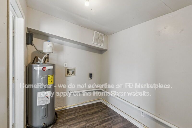 4 bedroom home with fenced yard property image