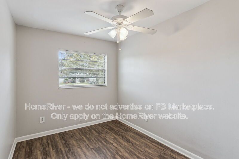 4 bedroom home with fenced yard property image