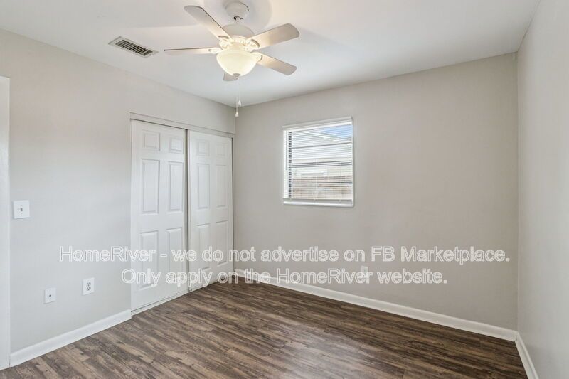 4 bedroom home with fenced yard property image