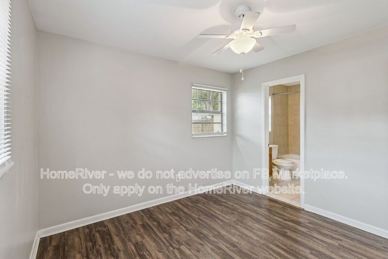 4 bedroom home with fenced yard property image