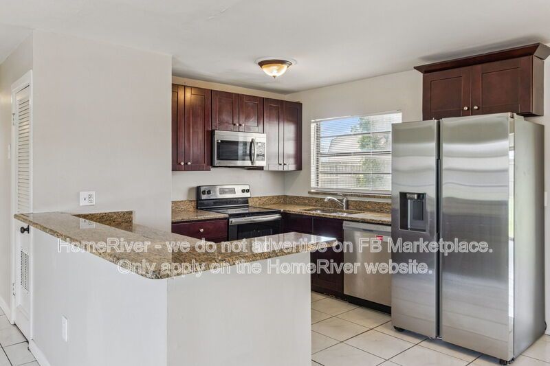 4 bedroom home with fenced yard property image