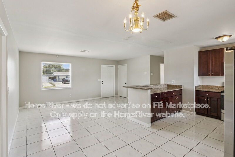 4 bedroom home with fenced yard property image