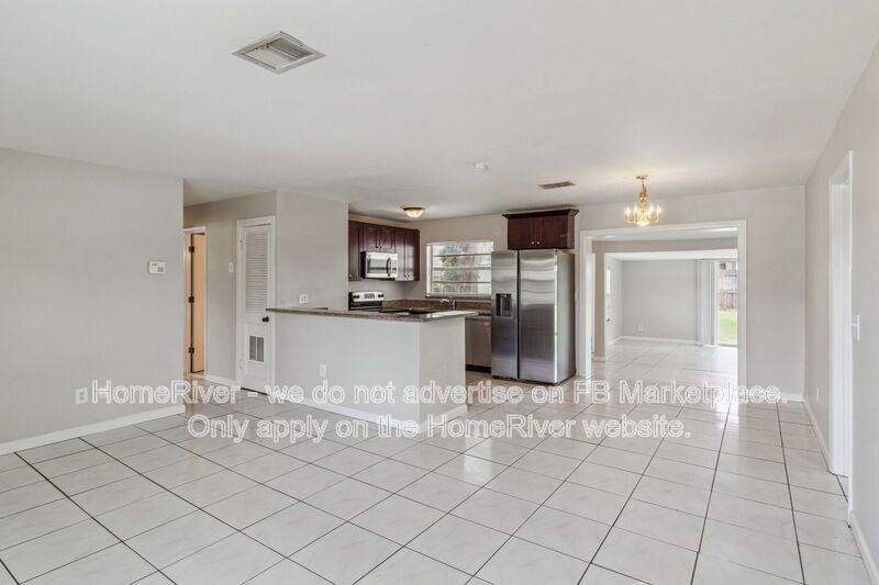 4 bedroom home with fenced yard property image