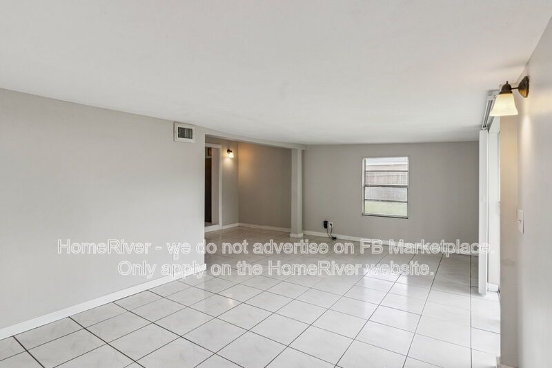 4 bedroom home with fenced yard property image