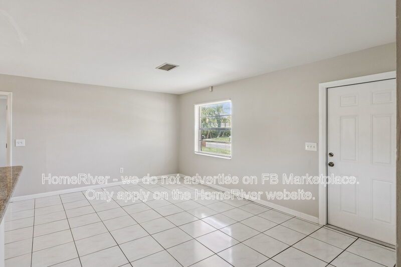 4 bedroom home with fenced yard property image