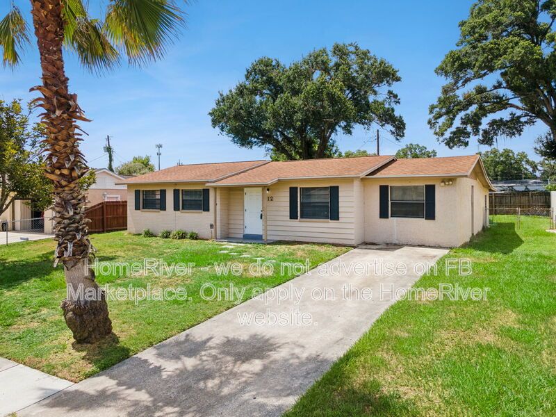 4 bedroom home with fenced yard property image