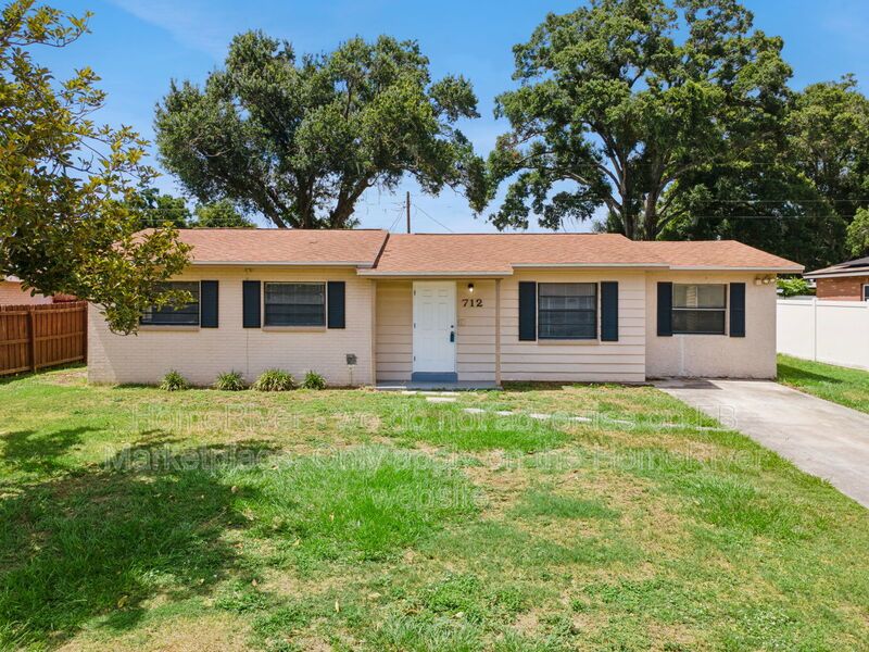 4 bedroom home with fenced yard property image